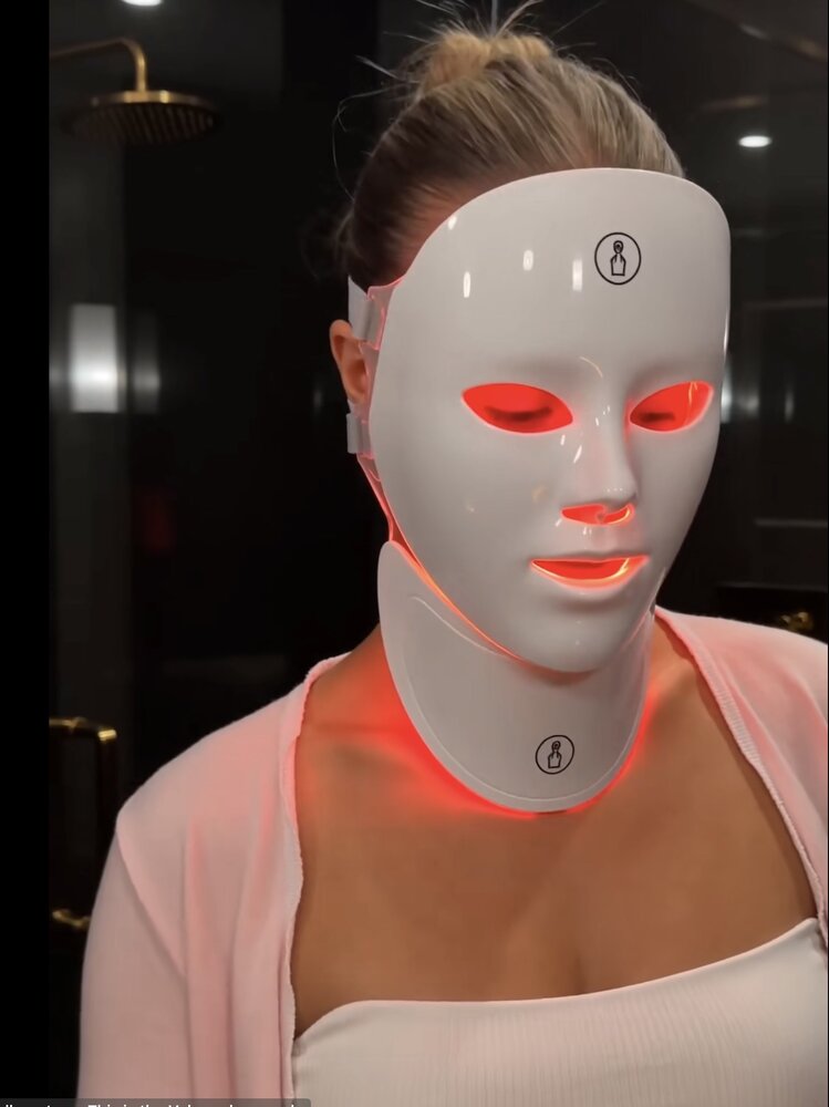 Beyond Skin LED mask and neck piece worn, glowing red