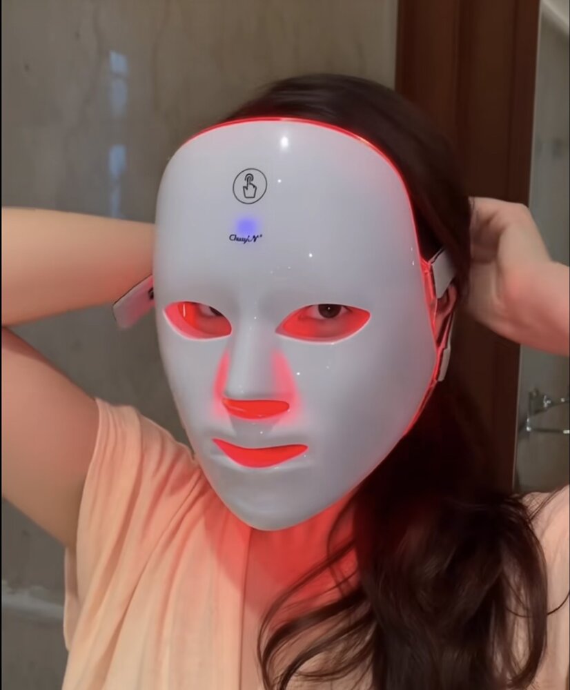 Beyond Skin LED mask worn during a red-light therapy session